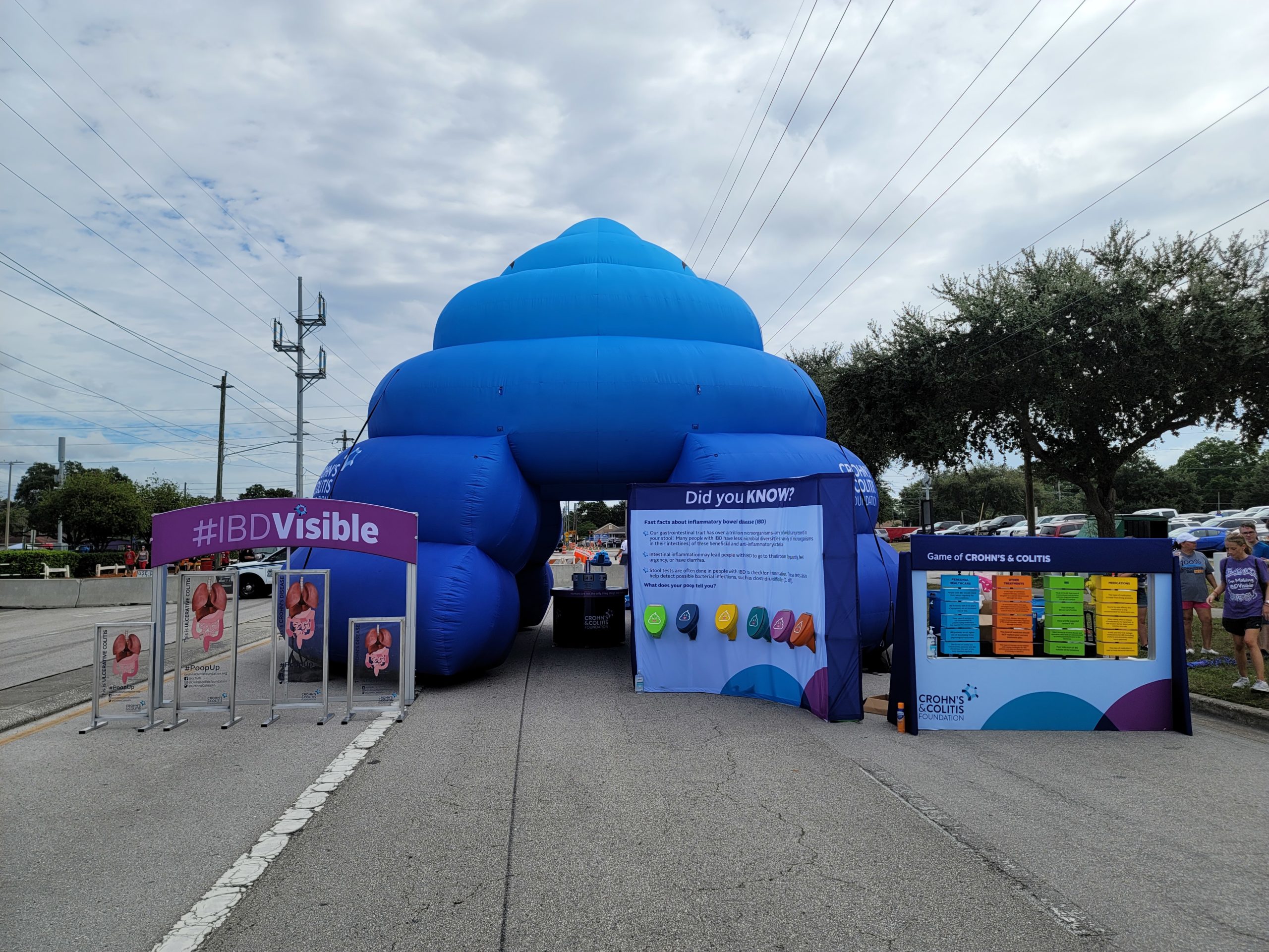 Blue inflatable tent with displays